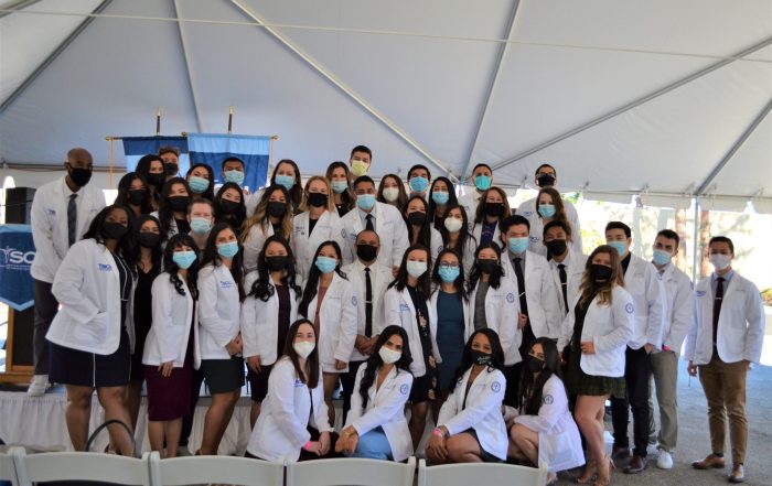 A group photo of SCU PA students after receiving their white coats