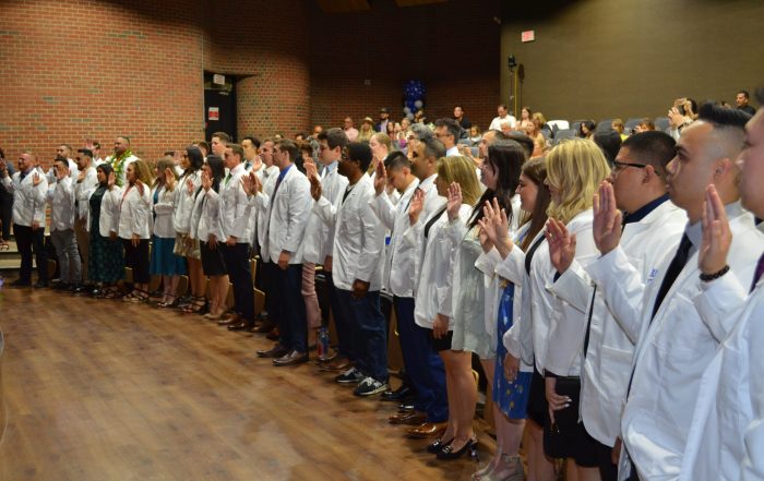 DC Students recite the Clinical Clerkship Oath during their White Coat Ceremony